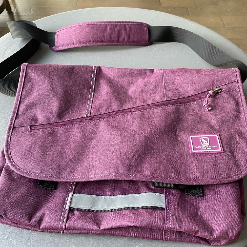 New, never used computer bag. Purple